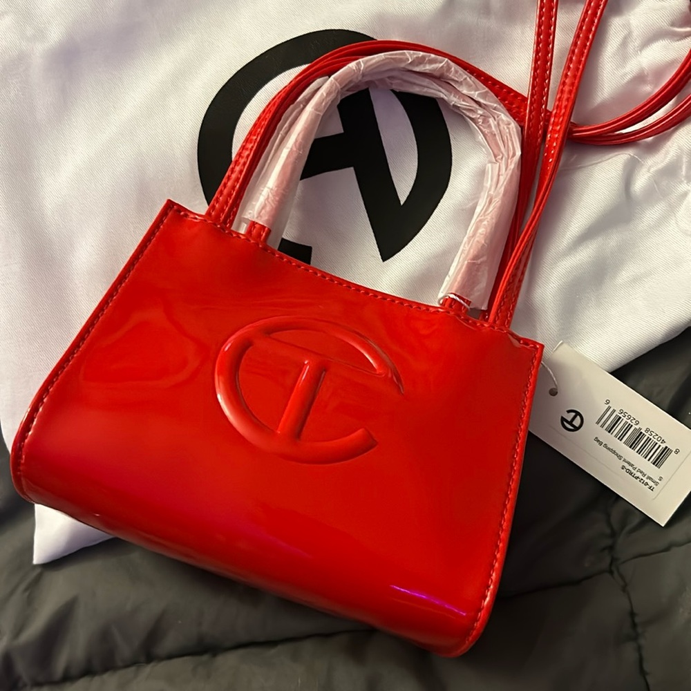 NWT NEVER WORN PATENT RED TELFAR SMALL.